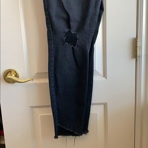 High-waisted distressed skinny jeans